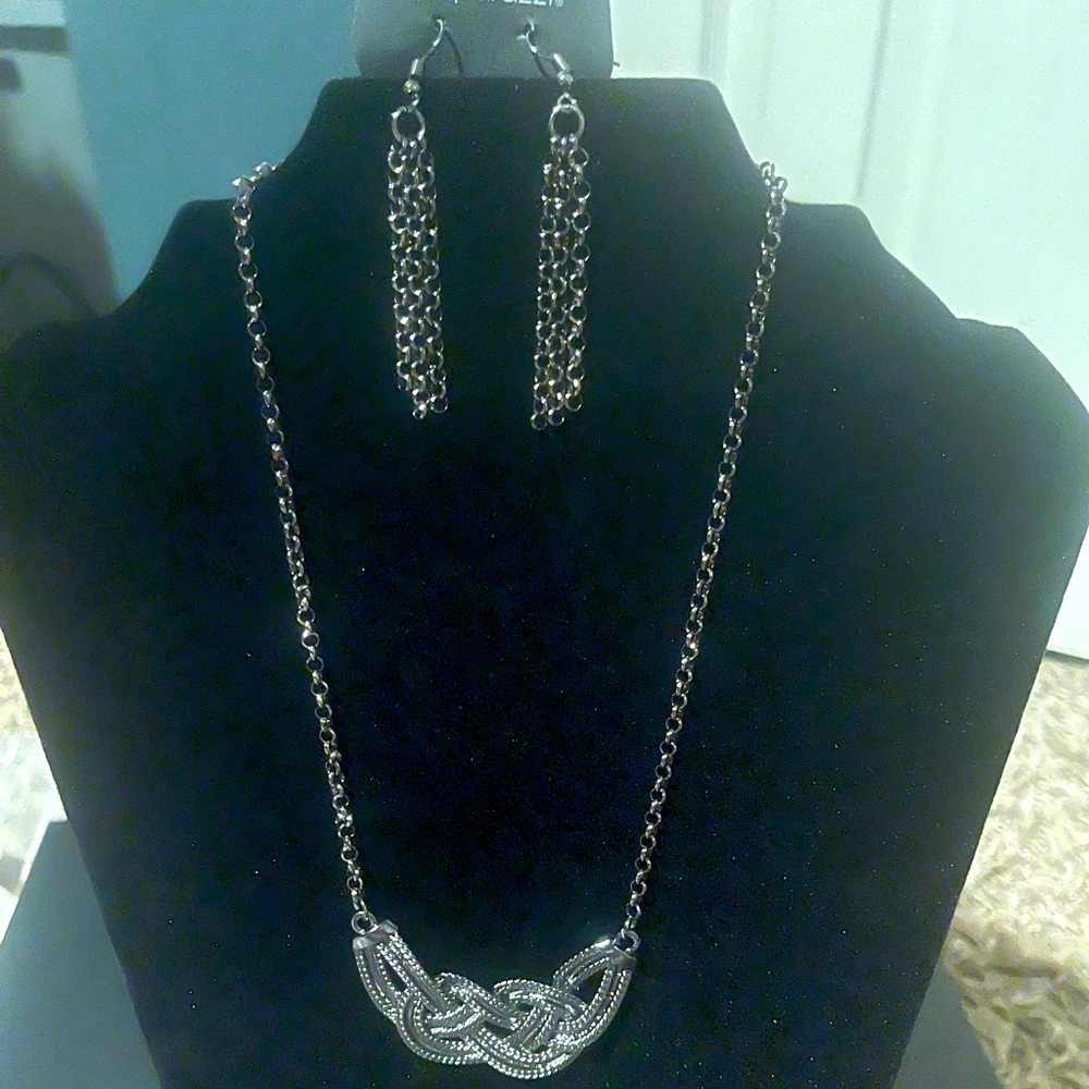 Necklace and earring set one size fits all.